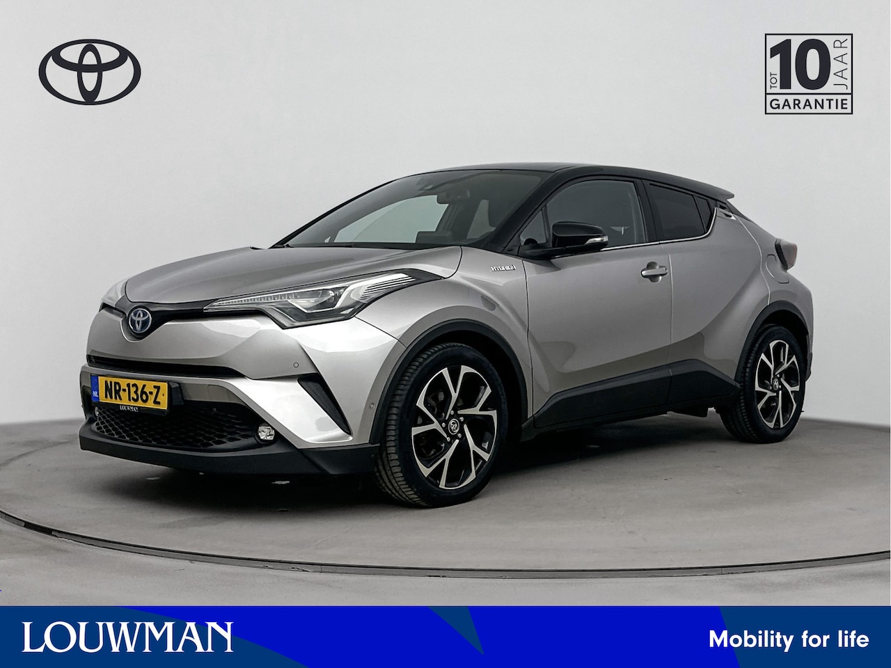 Toyota C-HR - 1.8 Hybrid Bi-Tone Plus | Stuur en stoelverwarming | Dode hoeksensor | Navigatie - AutoWereld.nl