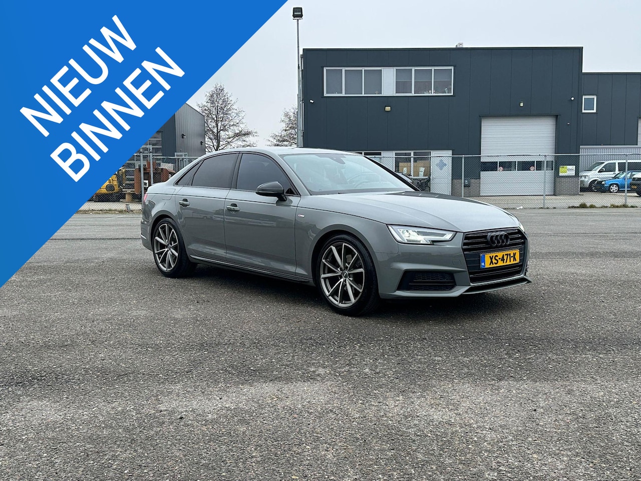 Audi A4 Limousine - 1.4 TFSI Sport S line black edition - AutoWereld.nl