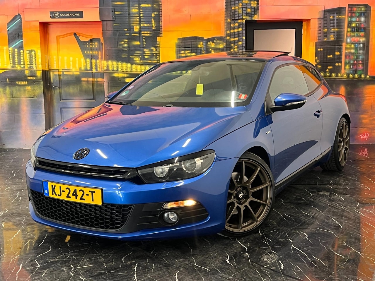 Volkswagen Scirocco - 2.0 TSI Panoramadak|Navi|Stoelverwarming - AutoWereld.nl