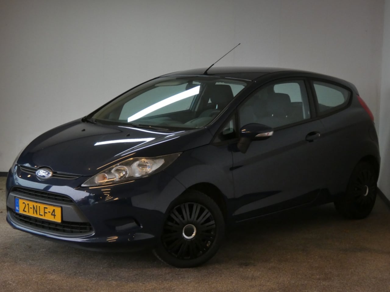 Ford Fiesta - 1.25 Limited Nwe APK airco - AutoWereld.nl