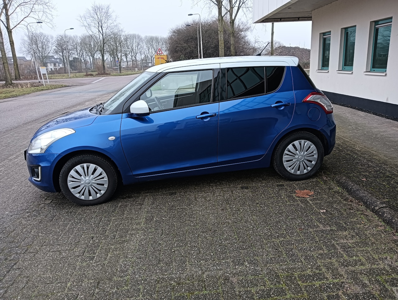 Suzuki Swift - Airco. Cruise control. Stoel verwarming. Topstaat. - AutoWereld.nl