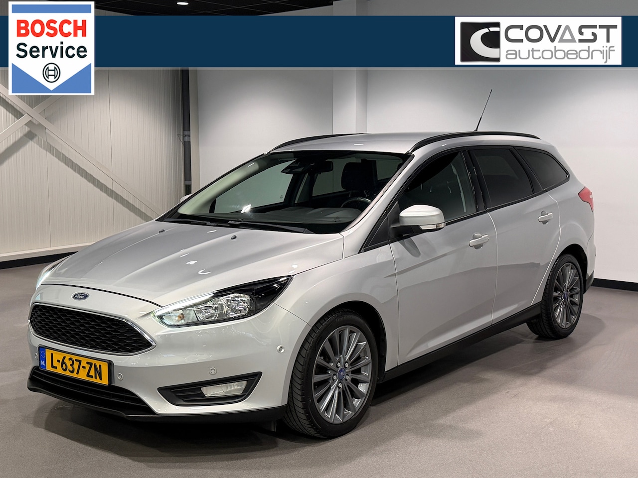 Ford Focus Wagon - 1.0 First Edition 125pk|Navigatie|Winterpakket|(in)parkeerhulp|LMV| - AutoWereld.nl