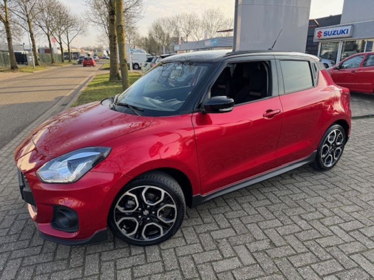 Suzuki Swift - 1.4 Boosterjet 129pk Smart Hybrid Sport - AutoWereld.nl