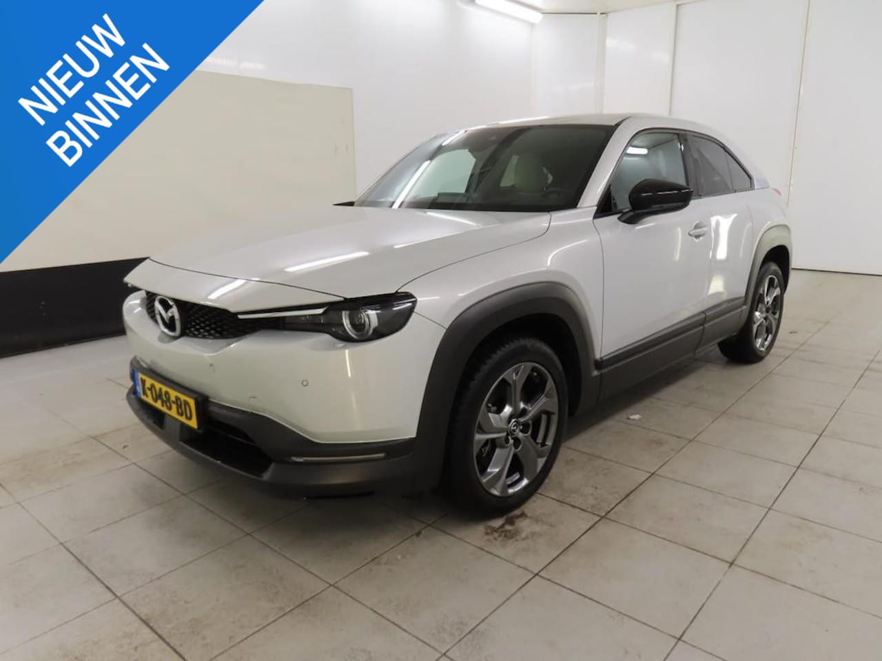 Mazda MX-30 - E-SKYACTIV 145 FIRST EDITION 36 KWH I 95% SOH I P-CAMERA I APPLE CARPLAY I ADAPTIVE CRUISE - AutoWereld.nl