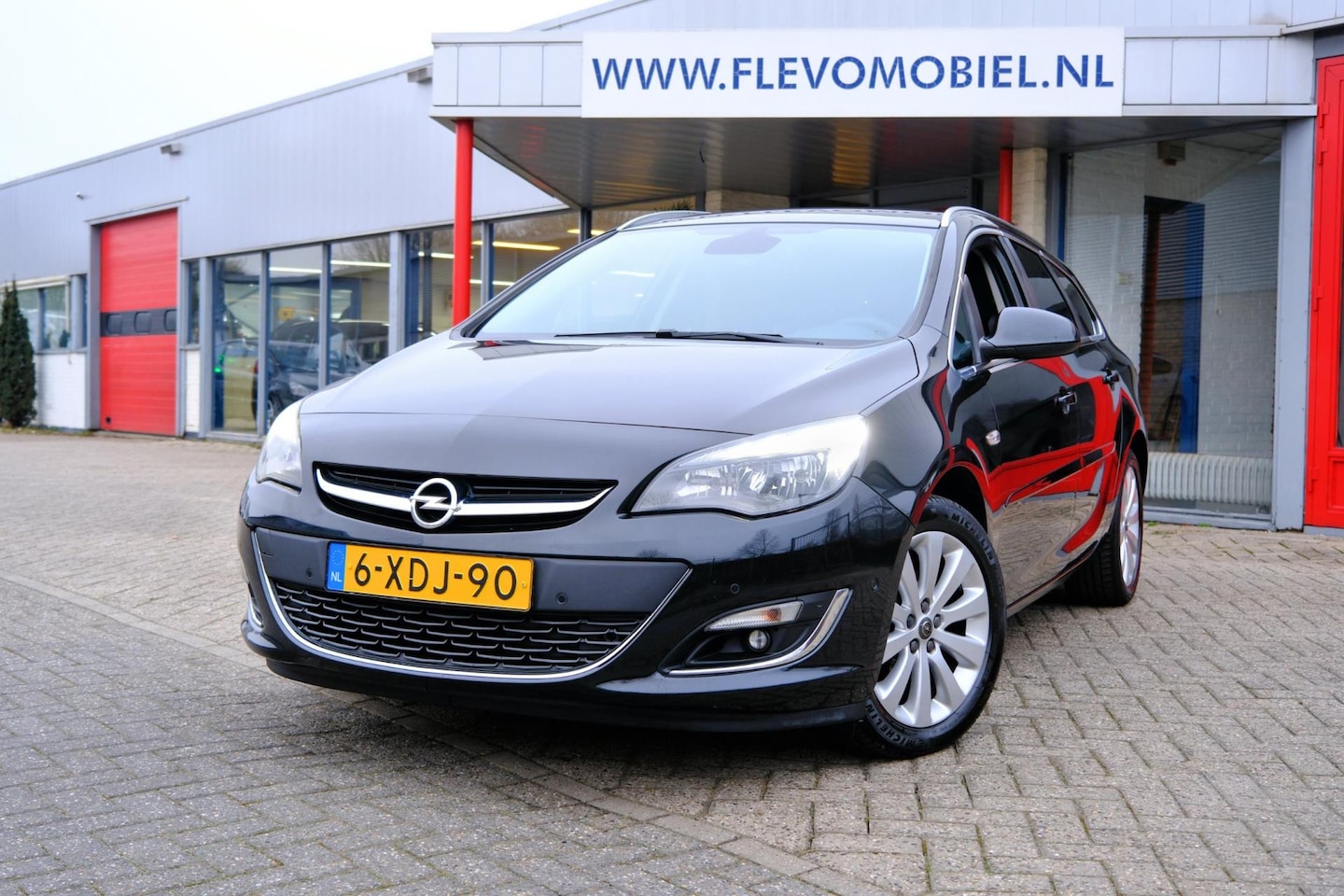 Opel Astra Sports Tourer - 1.4 Turbo Cosmo Navi|Half Leder|LMV|PDC - AutoWereld.nl