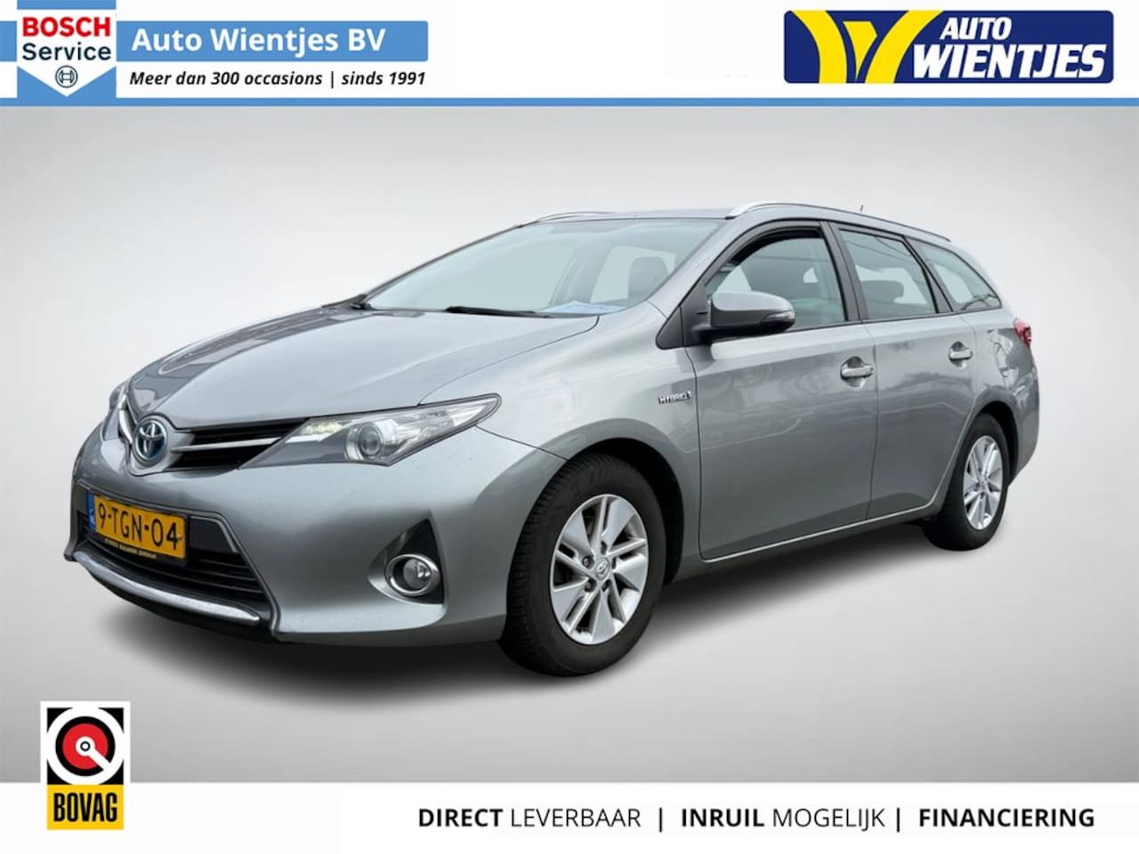 Toyota Auris Touring Sports - 1.8 Hybrid | Aspiration | Navi | Camera | Carplay - AutoWereld.nl