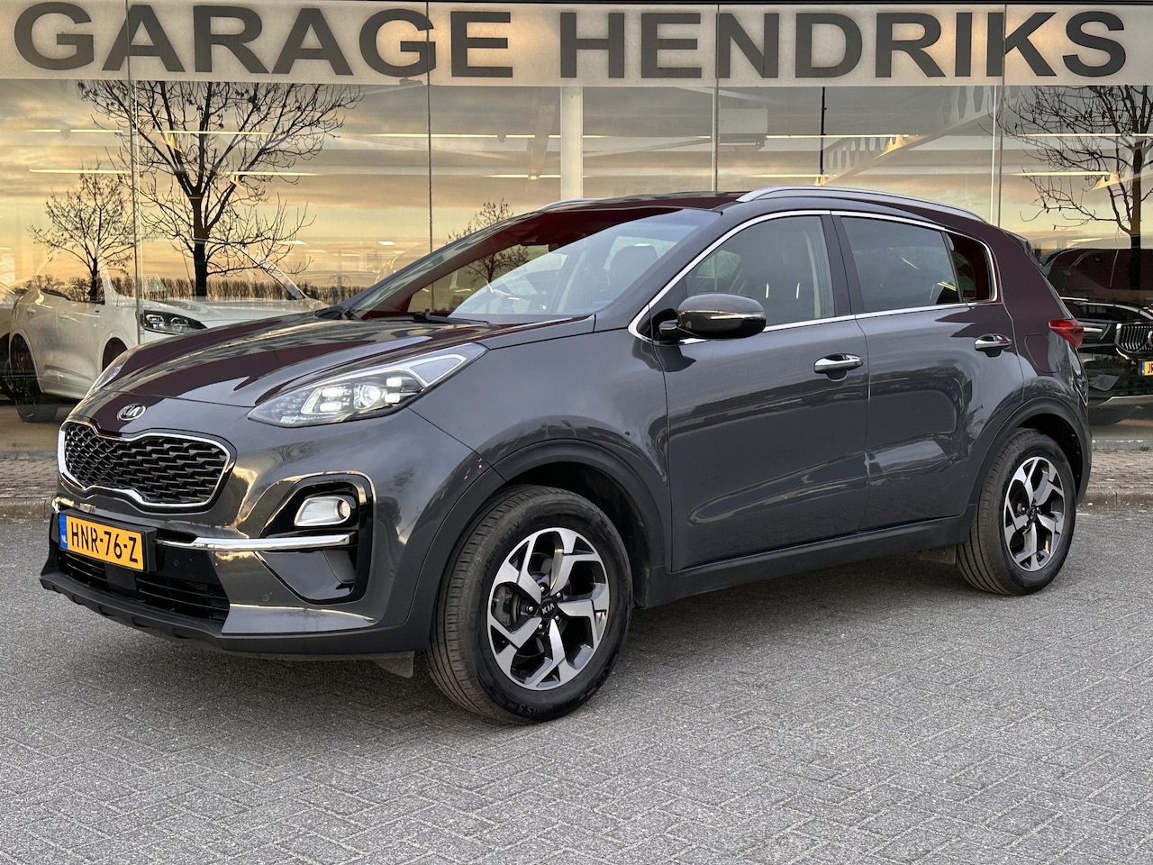 Kia Sportage - 1.6 GDI DynamicLine | Leder | Trekhaak | Stoel&Stuurverwarming | JBL-Audio | Climate | Nav - AutoWereld.nl