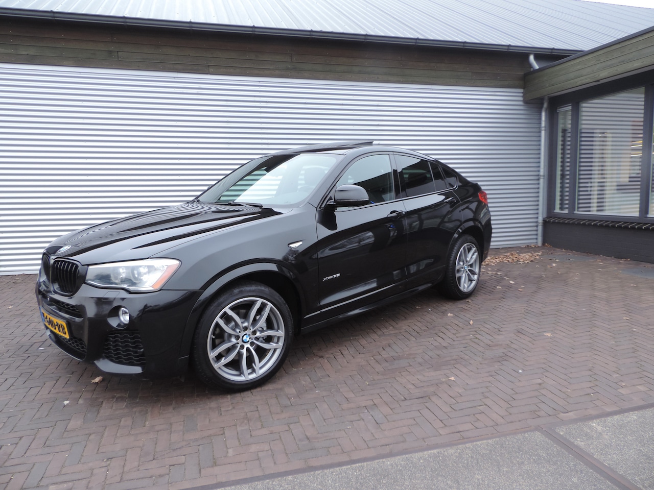 BMW X4 - xDrive35i High Executive zeer mooi - AutoWereld.nl