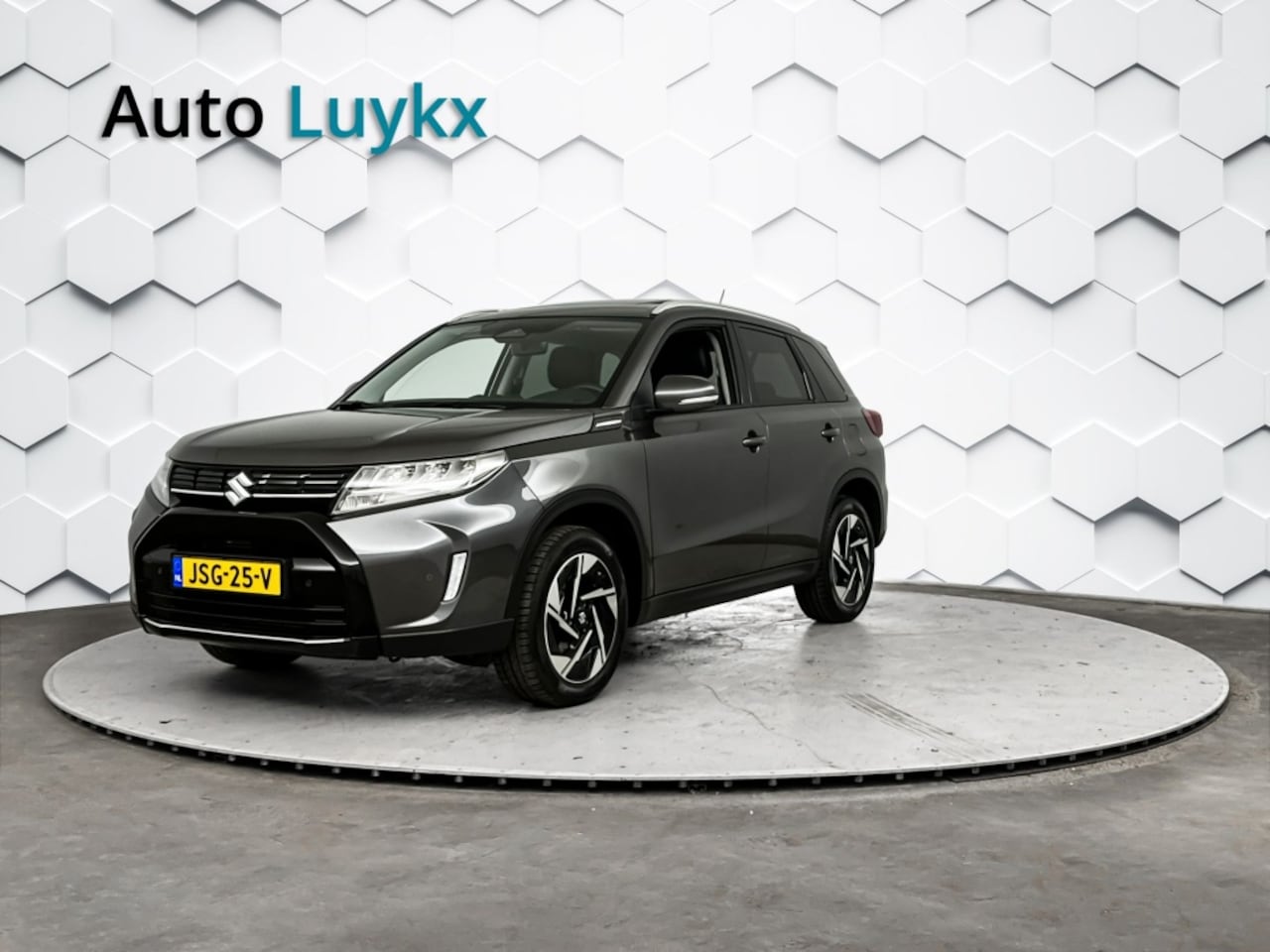 Suzuki Vitara - 1.5 Hybrid Style Automaat | Panoramadak | Adaptieve Cruise Control | Leder/Alcantara - AutoWereld.nl
