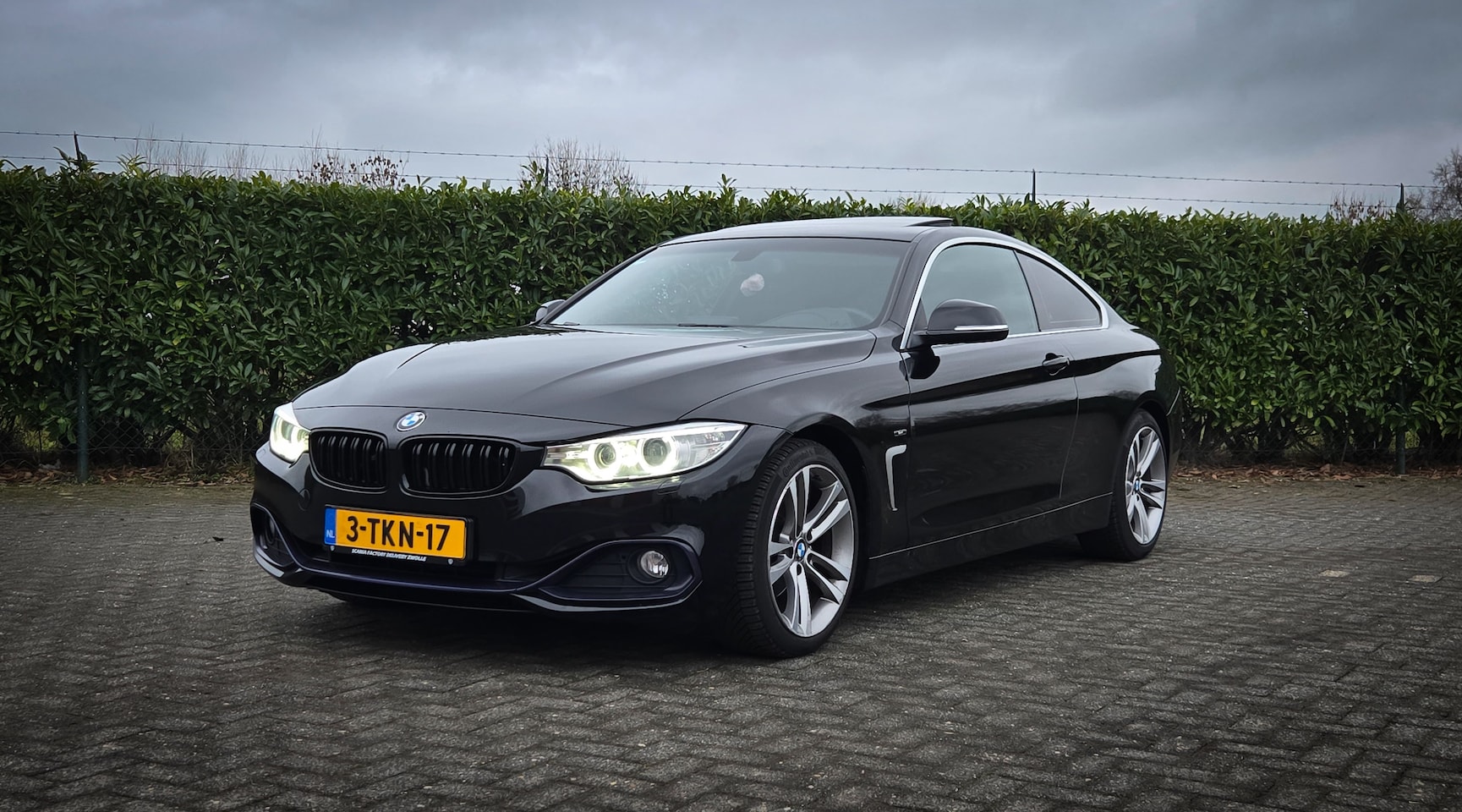 BMW 4-serie Coupé - 420i High Executive - AutoWereld.nl