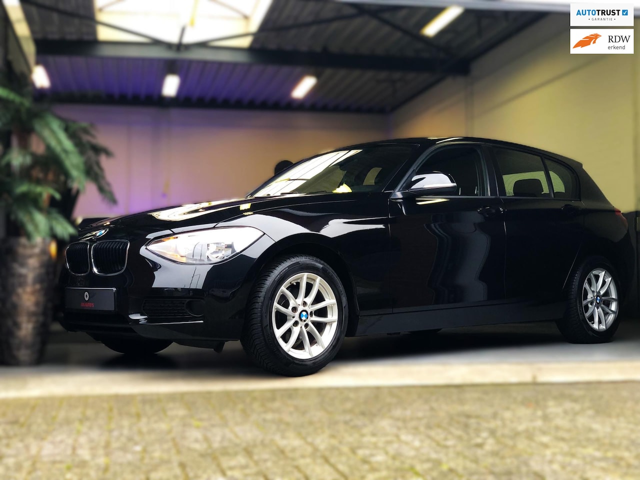 BMW 1-serie - 116i Sport 136pk/NAVI/PDC/USB/Stoelverw. - AutoWereld.nl