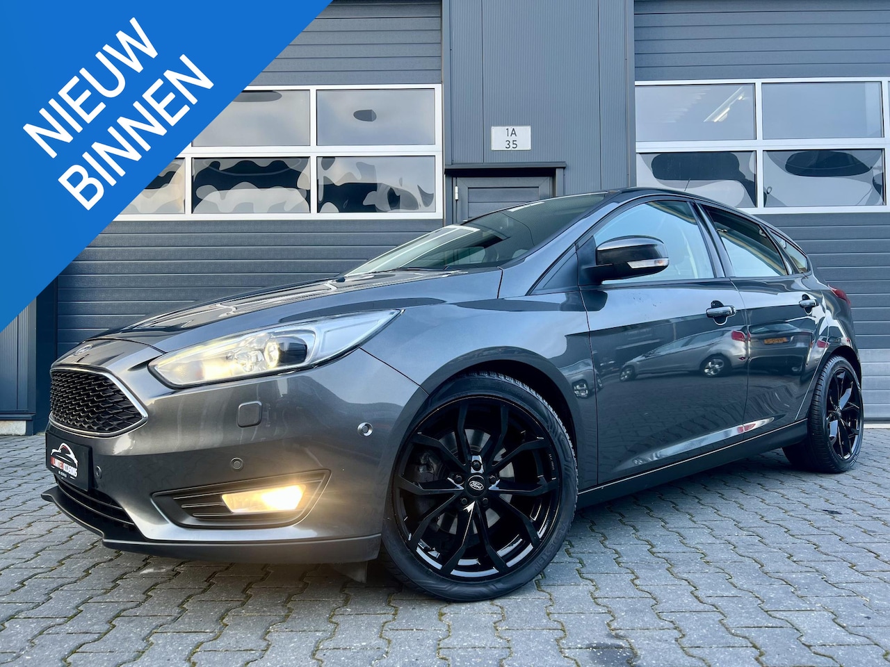 Ford Focus - 1.5 Titanium *NAVI*ECC*CRUISE*AUTOMAAT - AutoWereld.nl