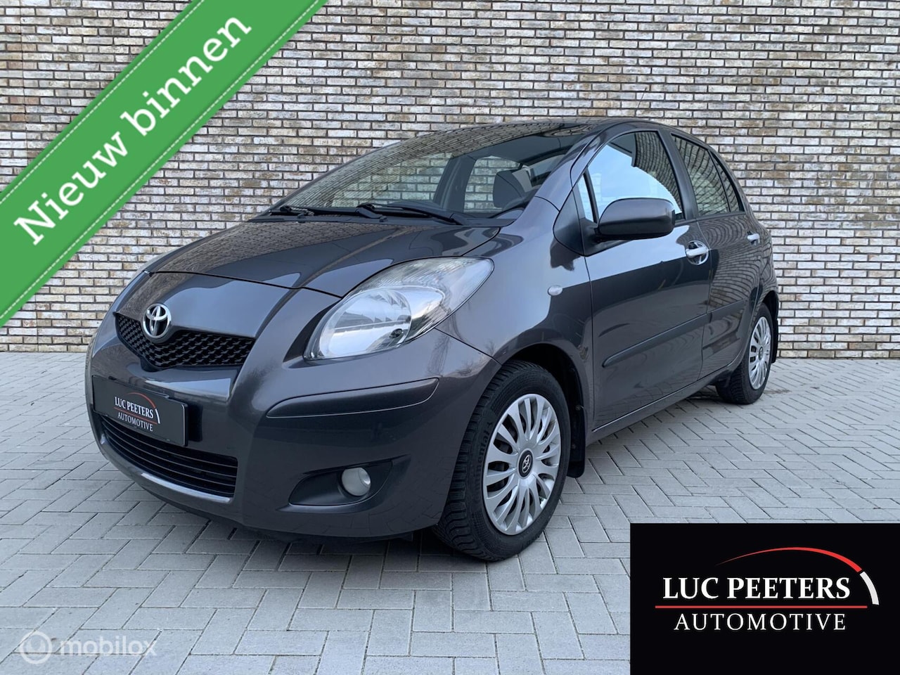 Toyota Yaris - 1.3 VVTi Aspiration AUT/NAP/CLIMA/PDC/TREKHAAK! - AutoWereld.nl