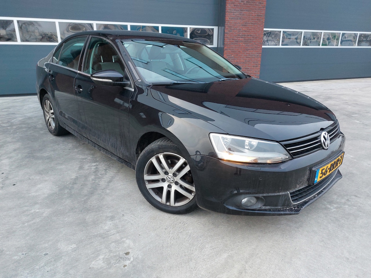 Volkswagen Jetta - 1.6 TDI Highline BlueMotion AIRCO/ECC/LMV/NAV - AutoWereld.nl