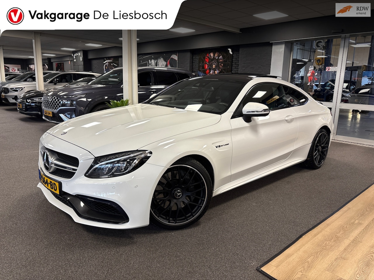 Mercedes-Benz C-klasse Coupé - AMG 63 / pano / leer / memory / Burmester / camera / boeken - AutoWereld.nl