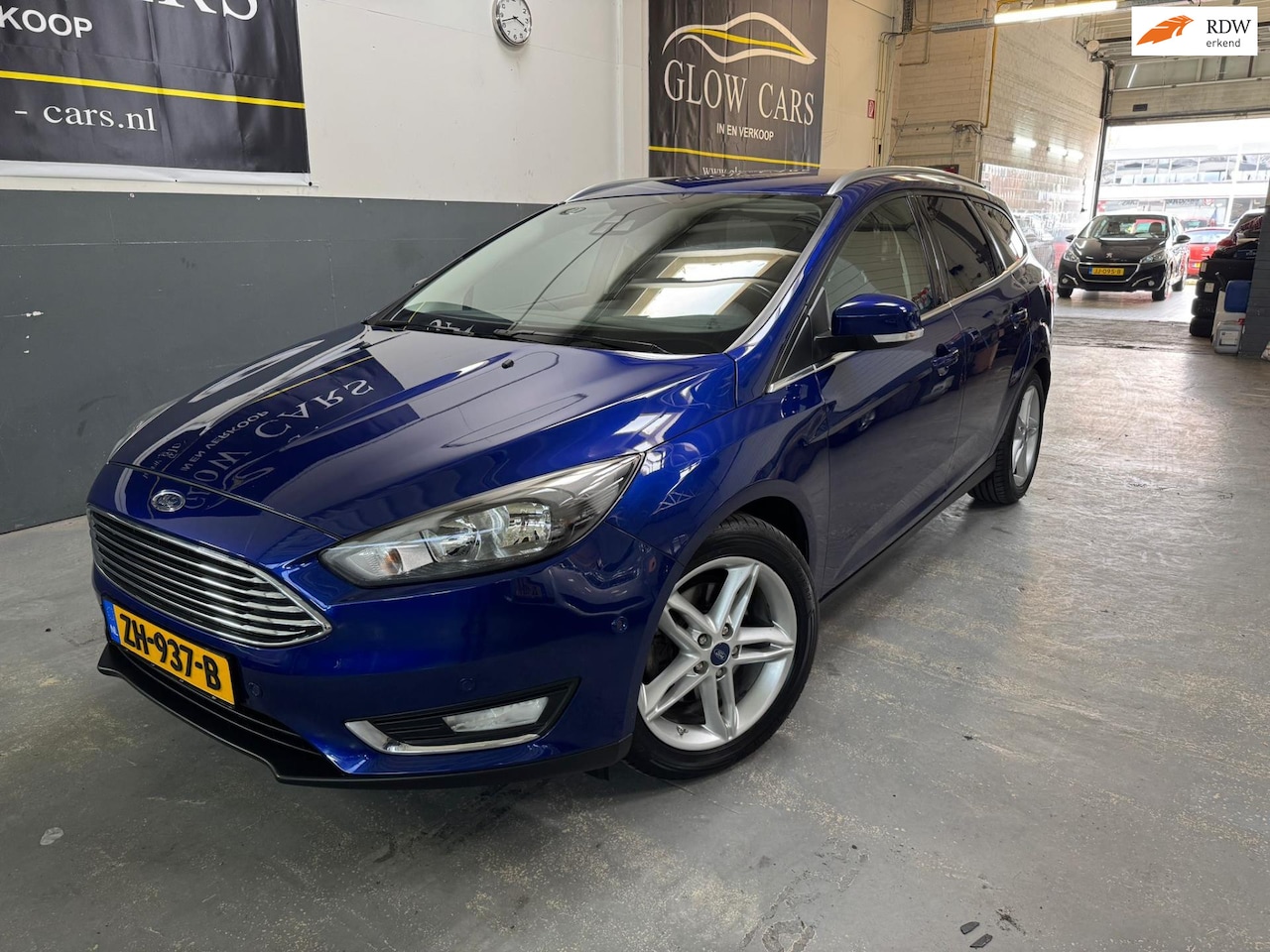 Ford Focus Wagon - 1.5 Titanium Edition |CRUISE|PDC|NAVI|STOEL.VERVARM| - AutoWereld.nl