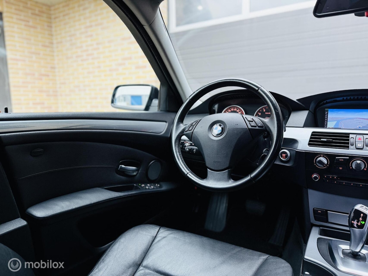 BMW 5-serie - 525i Executive|Automaat|Leer|Gr Navi|LM|2009 - AutoWereld.nl