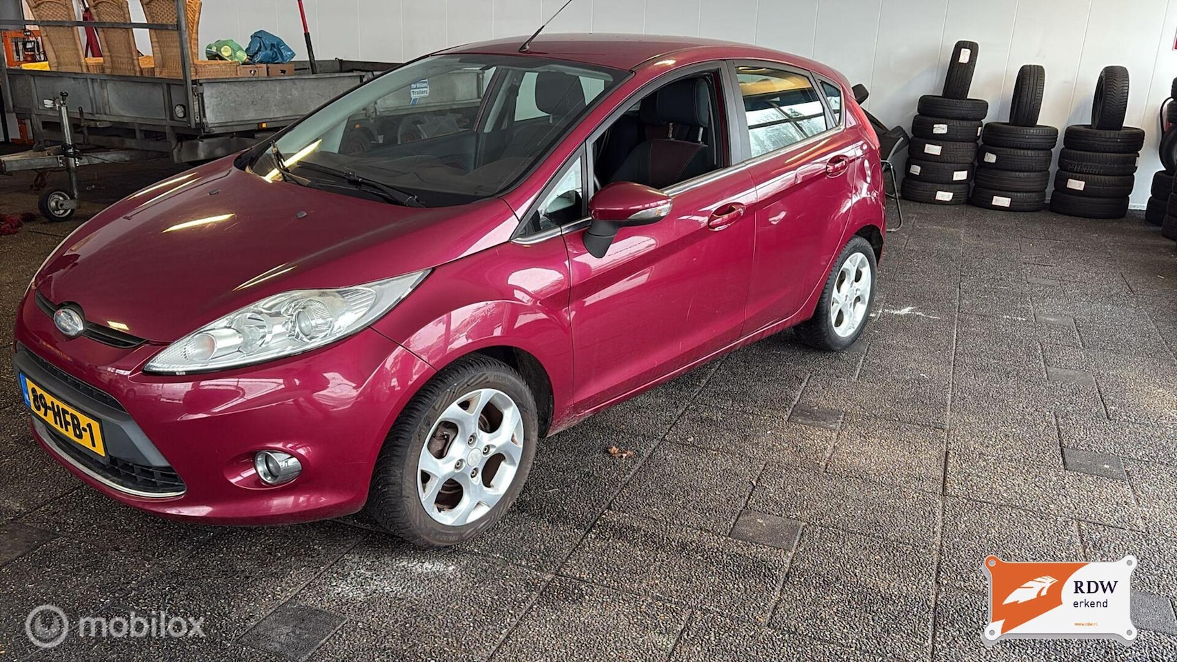 Ford Fiesta - 1.25 Ghia 1.25 Ghia - AutoWereld.nl