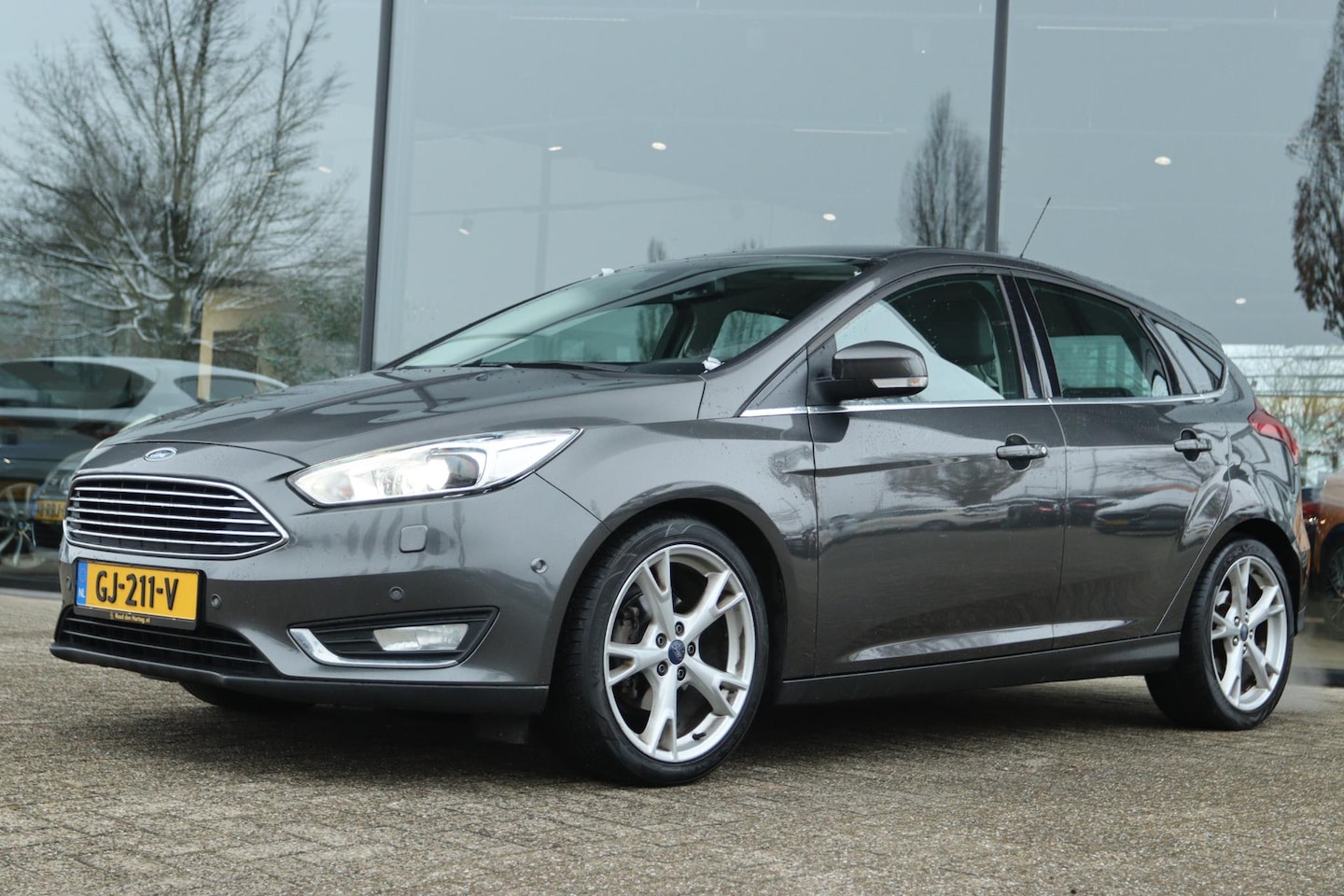 Ford Focus - 1.0 TITANIUM ED. | XENON | WINTERPACK | NAVI | PDC | CRUISE - AutoWereld.nl