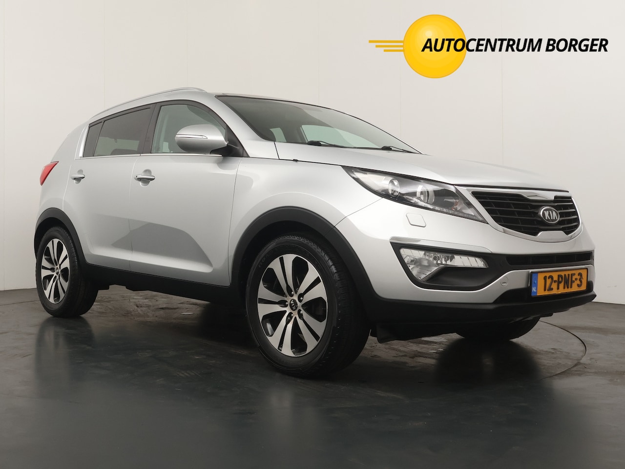 Kia Sportage - 2.0 X-clusive Automaat / PanoramaDak / Leder / Trekhaak / Navi / Stoelverwarming - AutoWereld.nl