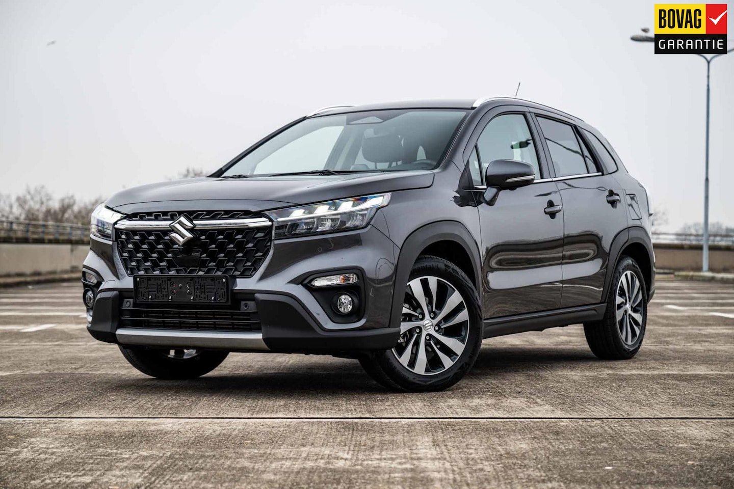 Suzuki S-Cross - 1.4 Boosterjet AllGrip Style Smart Hybrid | Airco/Clima | Adaptive Cruise Control | Camera - AutoWereld.nl