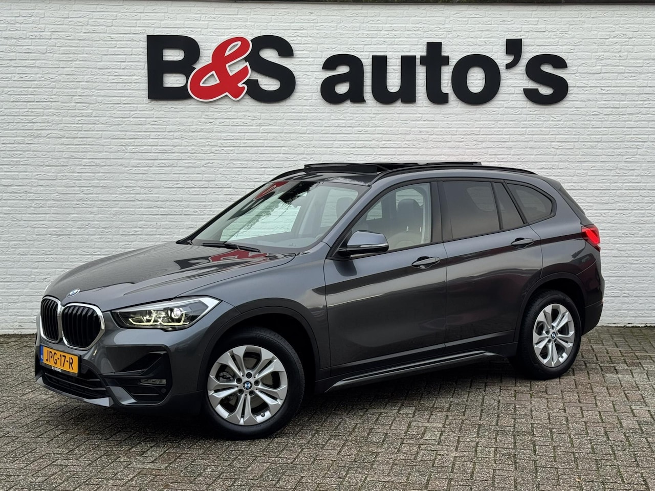 BMW X1 - SDrive18i High Executive Cruise Climate control Leer+memory Sfeerverlichting Navigatie Ful - AutoWereld.nl