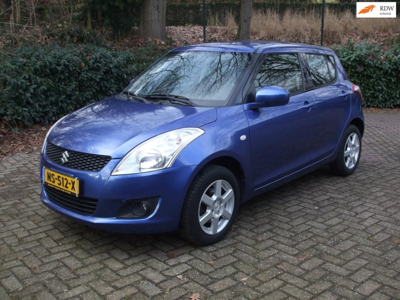 Suzuki Swift - 1.2 Dynamic Allgrip 4VWD EASSS airco 102 dkm 5 drs blauw - AutoWereld.nl