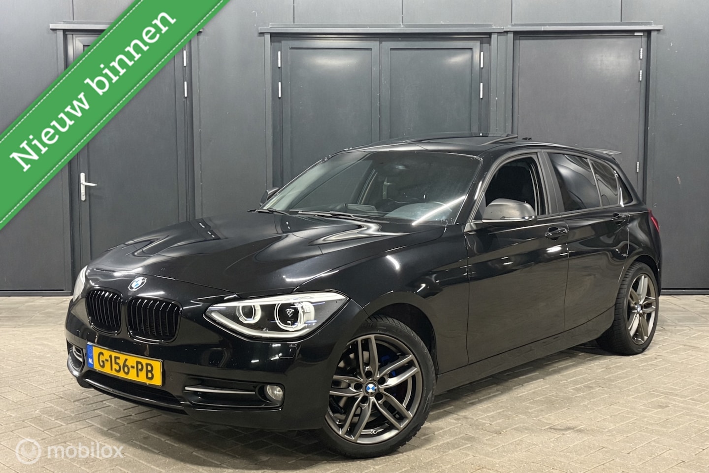 BMW 1-serie - 116i High Executive schuifdak|stoelverwarming! - AutoWereld.nl