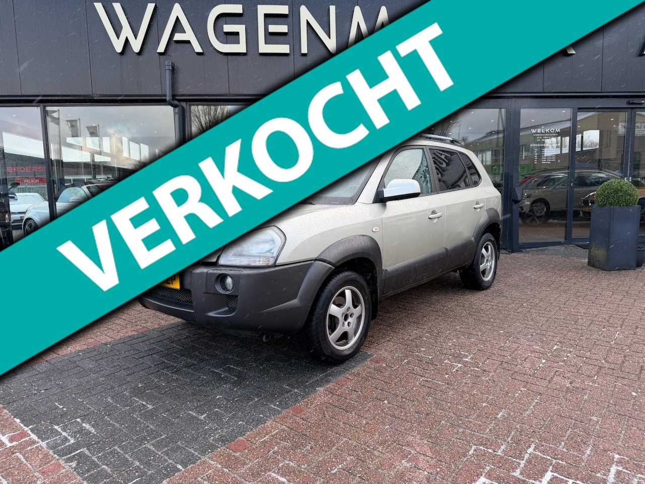 Hyundai Tucson - 2.0i Dynamic Airco|Cruise|Trekhaak! - AutoWereld.nl
