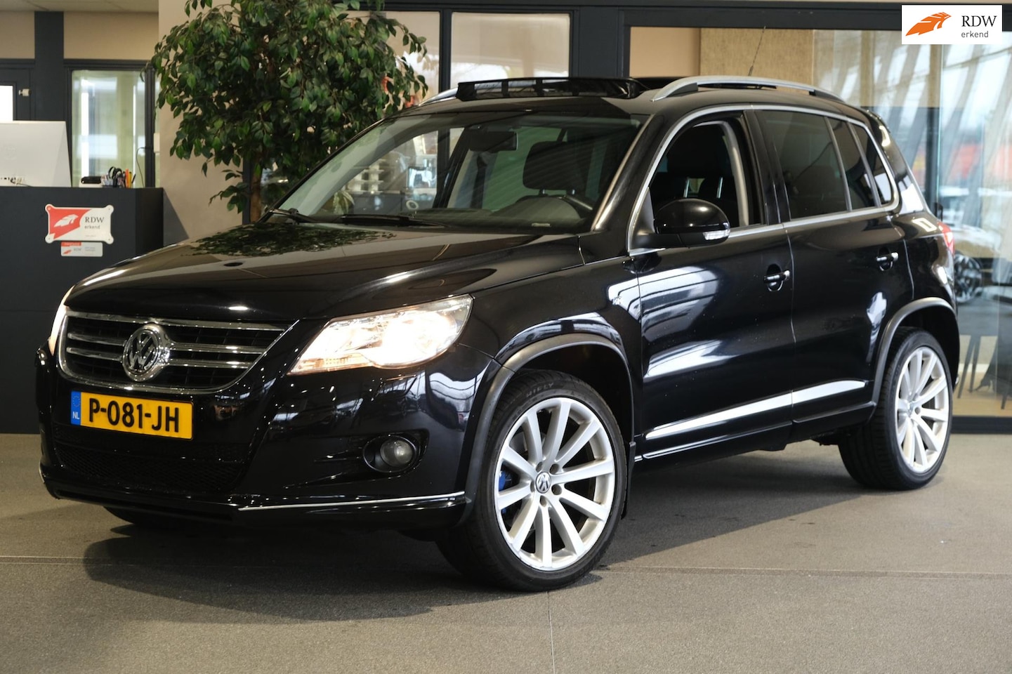 Volkswagen Tiguan - 1.4 TSI 4Motion R-Line Pano Trek Cruise Pdc MF-stuur - AutoWereld.nl