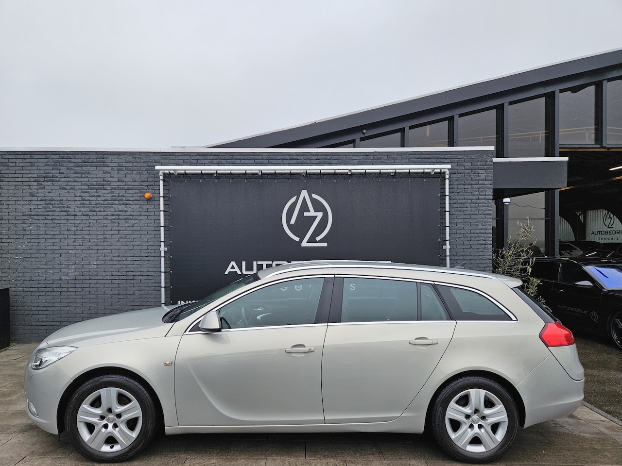 Opel Insignia Sports Tourer - 1.8 Edition *AC*Navi* - AutoWereld.nl