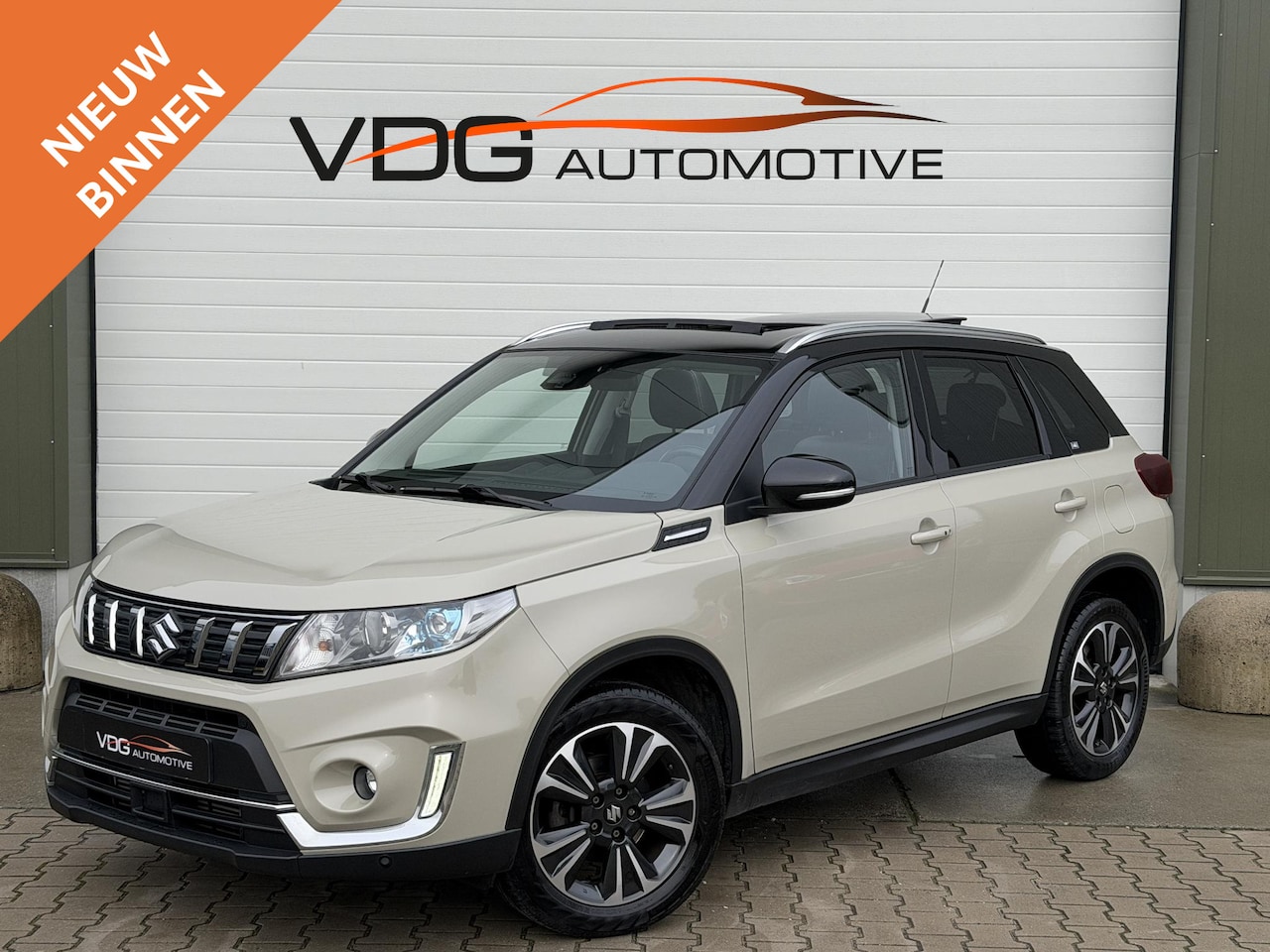 Suzuki Vitara - 1.4 140 pk Automaat Style / Pano / Clima / Camera / Keyless / Alcantara / Adaptive Cruise - AutoWereld.nl