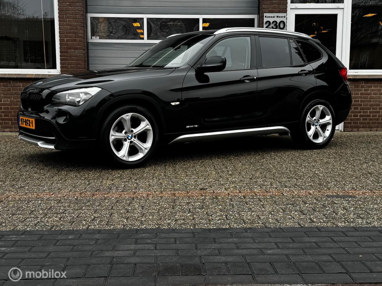 BMW X1 - sDrive18i Executive LEDER/ECC-AIRCO/NAVIGATIE - AutoWereld.nl