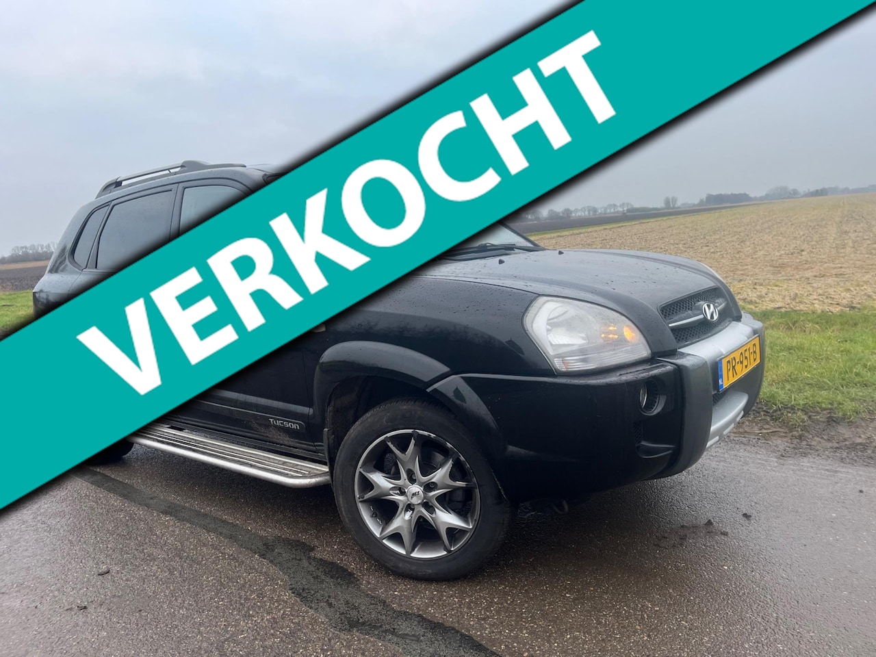Hyundai Tucson - 2.0i Active / 150.000km leder - AutoWereld.nl