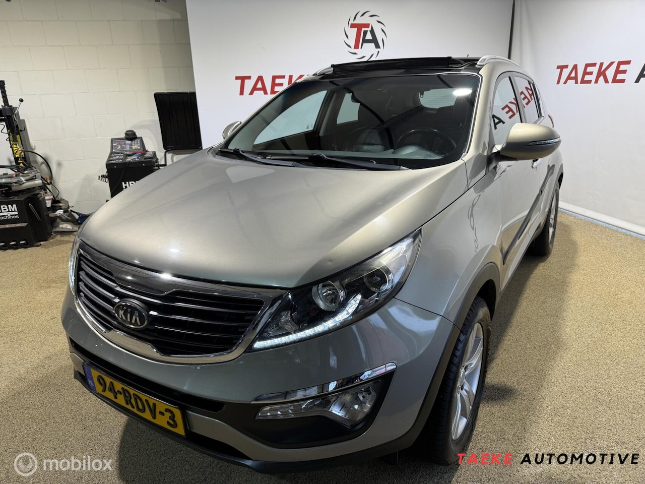 Kia Sportage - 2.0 X-ecutive PlusPack APK/NAP/CLIMA/PANO/CRUIS - AutoWereld.nl