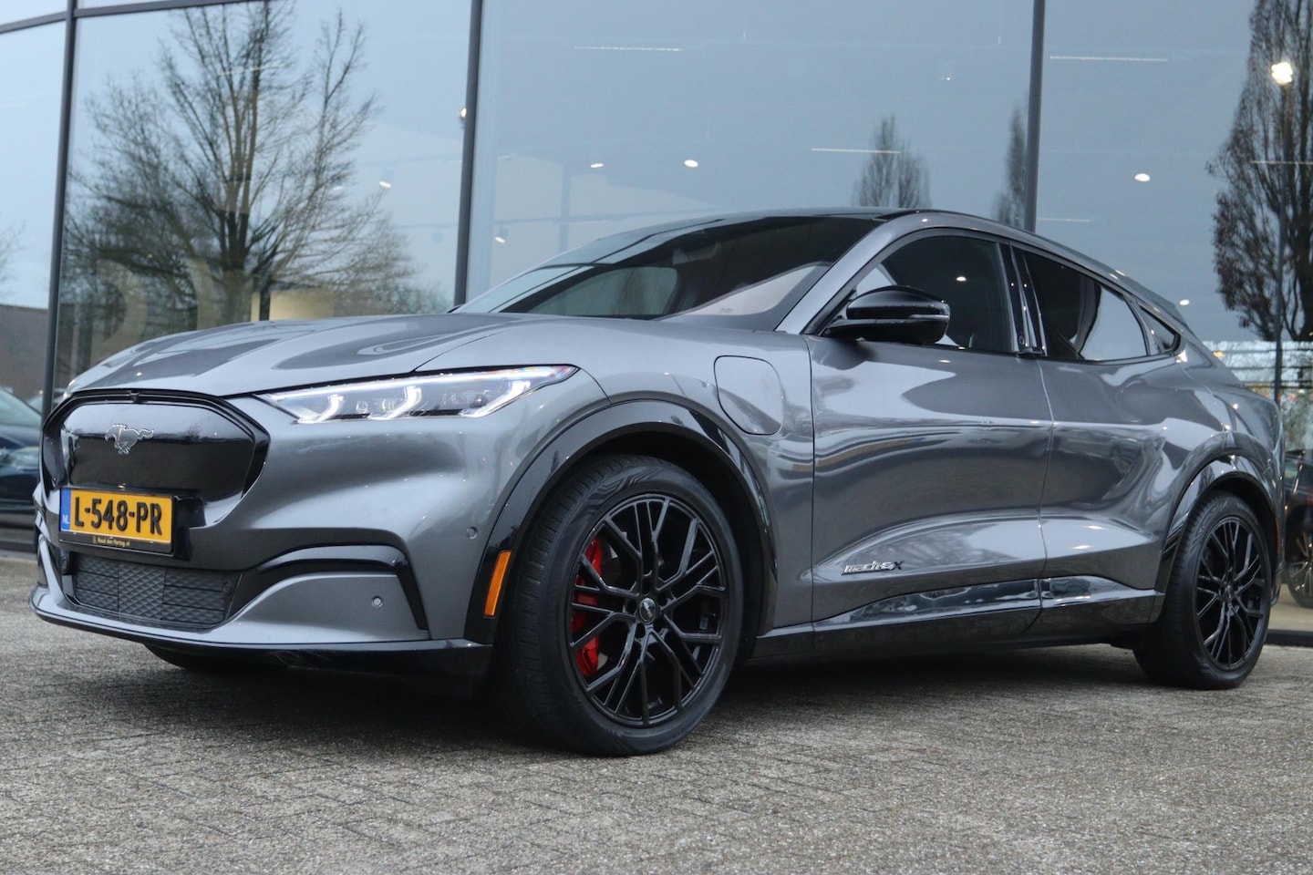 Ford Mustang Mach-E - EXTENDED FIRST EDITION AWD 98KWH ORIG. NL | 373PK | CARPLAY | 360 CAMERA | B&O | MEMORY | - AutoWereld.nl