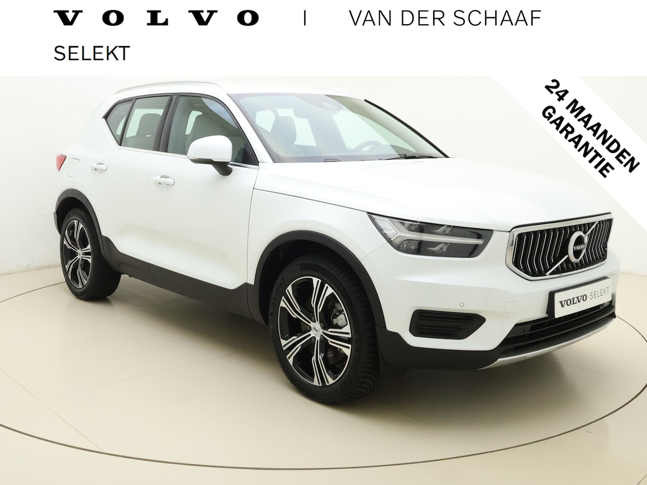 Volvo XC40 - T4 211pk Recharge Inscription / Blond Leder / 19'' + All Season / Trekhaak / Keyless / PDC - AutoWereld.nl