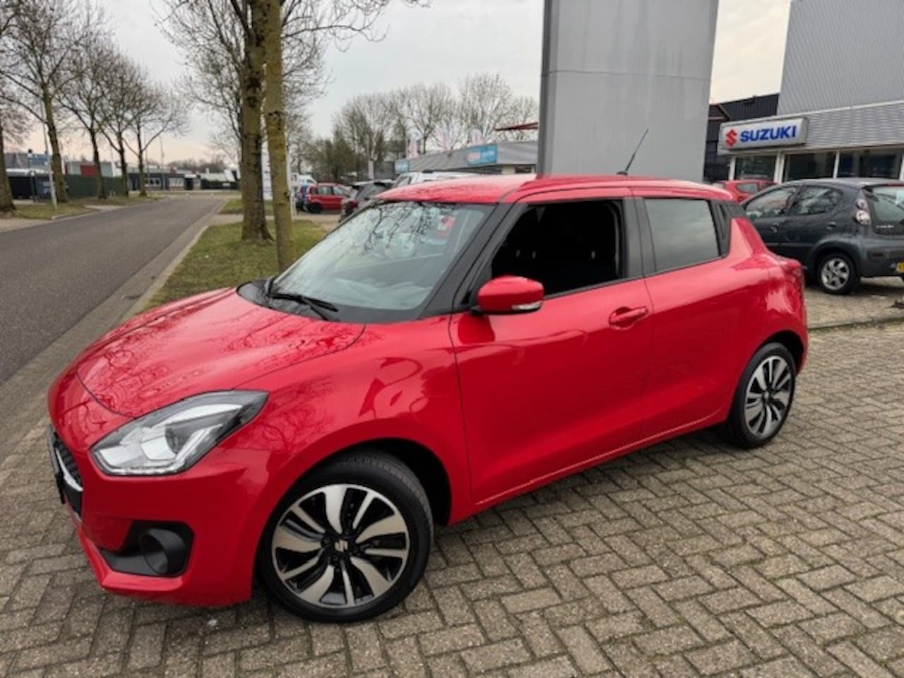 Suzuki Swift - 1.0 Boosterjet 112pk Stijl AUTOMAAT - AutoWereld.nl