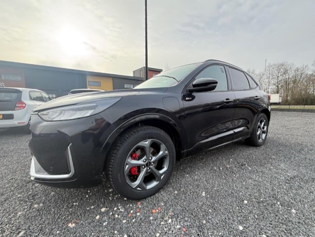 Ford Kuga - 2.5 PHEV hybride 178 kw St-line X technopack, camera, winterpack, trekhaak, agr stoelen in - AutoWereld.nl