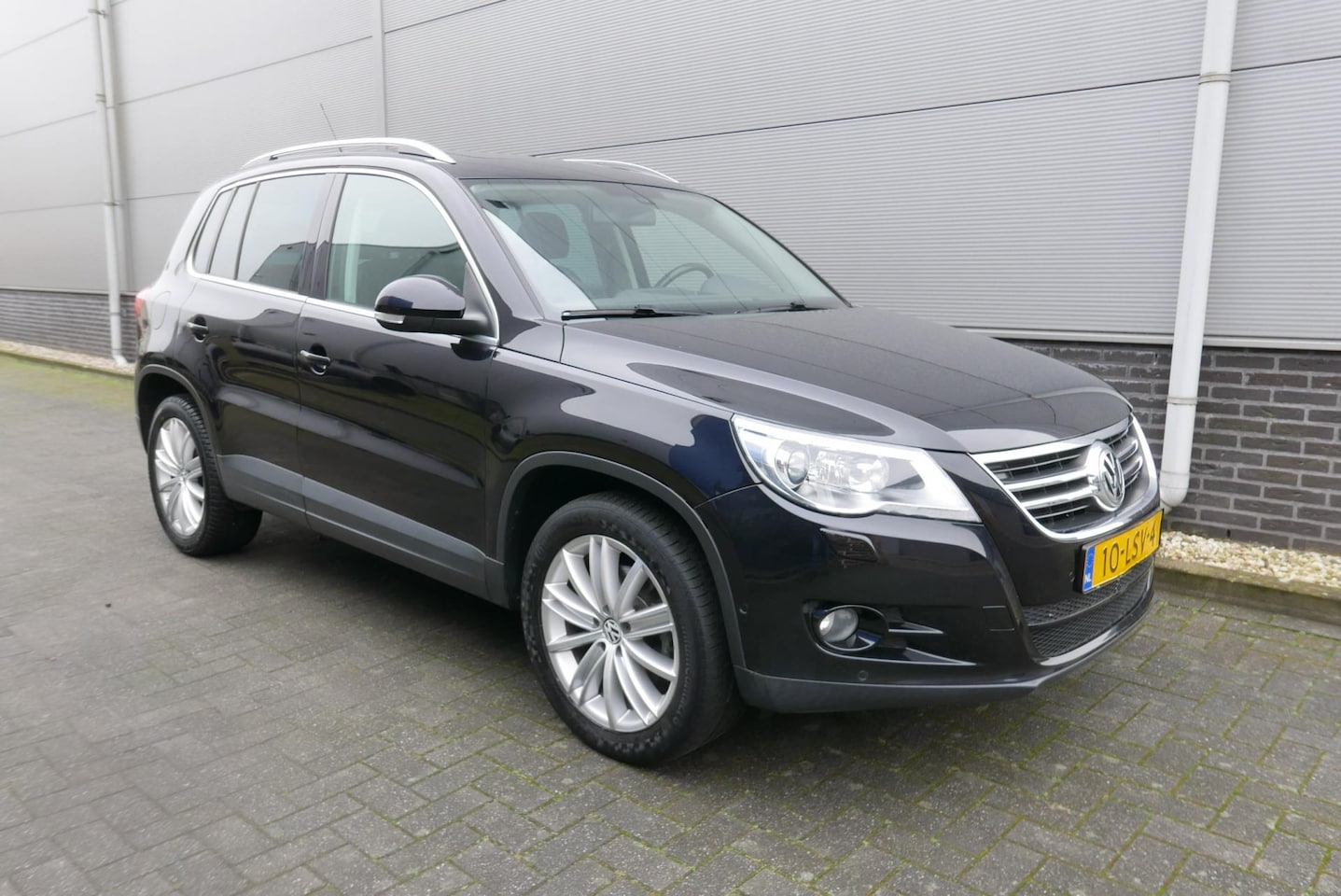 Volkswagen Tiguan - 1.4 TSI Sport&Style 4 Motion CLIMA,NAVI,LEER,PANORAMADAK,TREKHAAK. - AutoWereld.nl