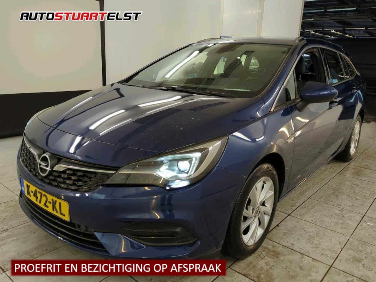 Opel Astra Sports Tourer - 1.2 Elegance 1e Eigenaar | Volledig Onderh | BTW | NAP | Camera | Navi | Cruise | Keyless - AutoWereld.nl