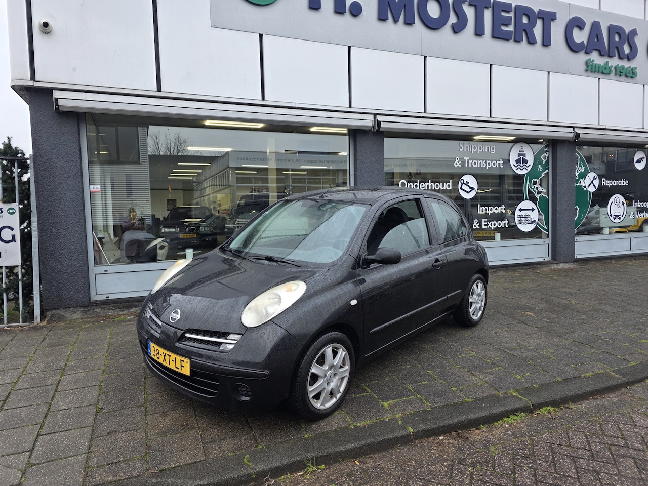 Nissan Micra - 1.2 ELLE APK t/m 02-2027 *Airco *Radio Cd *Electr. Ramen Zwart Metallic*Sportvelgen *APK t - AutoWereld.nl