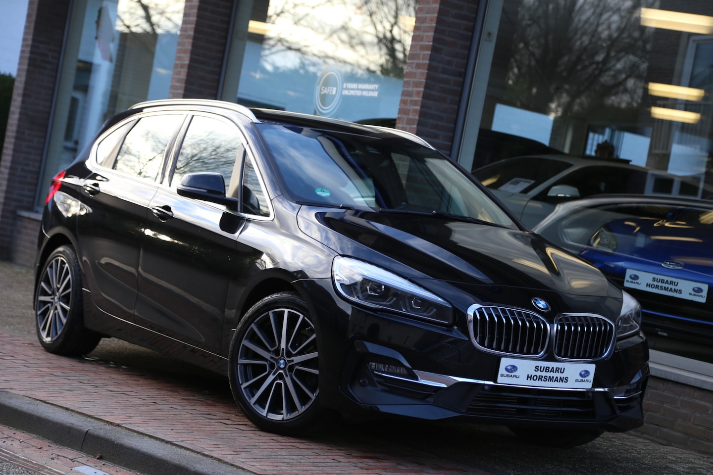 BMW 2-serie Active Tourer - 218i High Executive Edition Leer LED Navi HuD - AutoWereld.nl