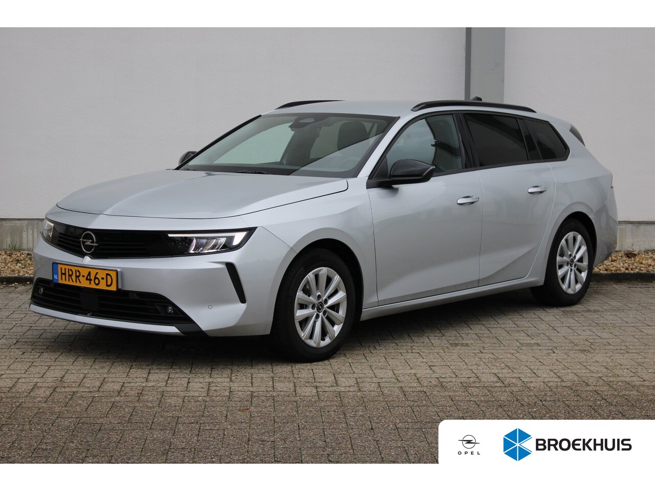 Opel Astra Sports Tourer - 1.2 Turbo Business Edition / Navigatie / Camera / AGR / Stuur -en Stoelverwarmd / Keyless - AutoWereld.nl