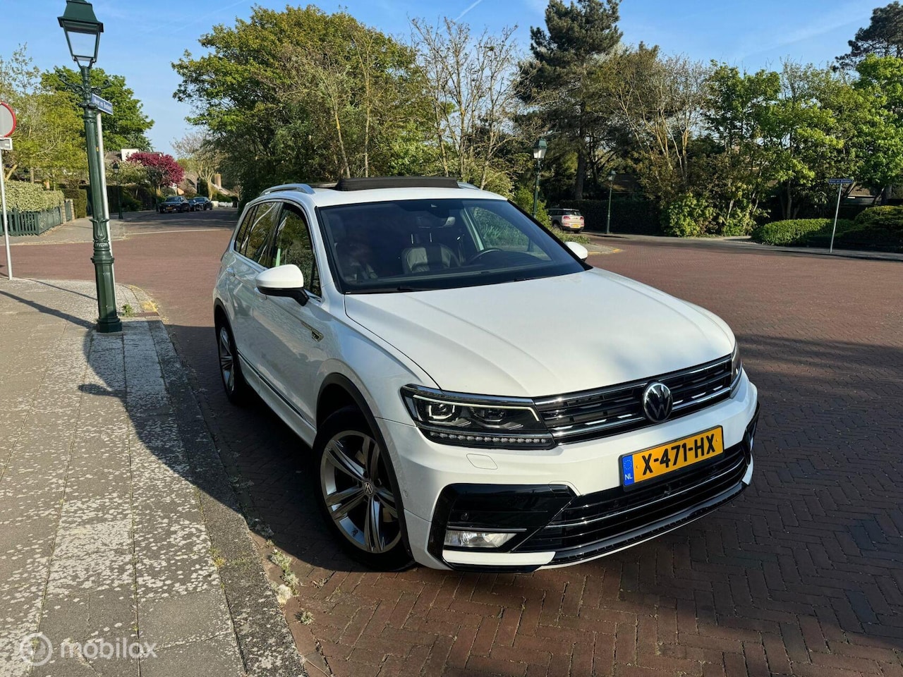 Volkswagen Tiguan - 2.0 TSI 4Motion Highline 2.0 TSI 4Motion Highline - AutoWereld.nl