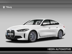 BMW i4 - eDrive40 84 kWh | Achteruitrijcamera | Cruise control | Elektrisch verwarmde voorstoelen