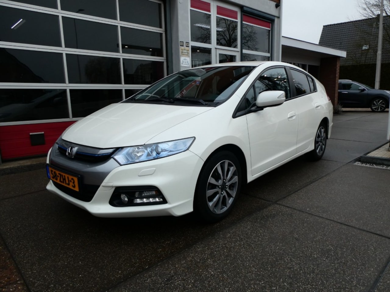 Honda Insight - 1.3 EXECUTIVE cruise/klima/leer/navi/pdc - AutoWereld.nl