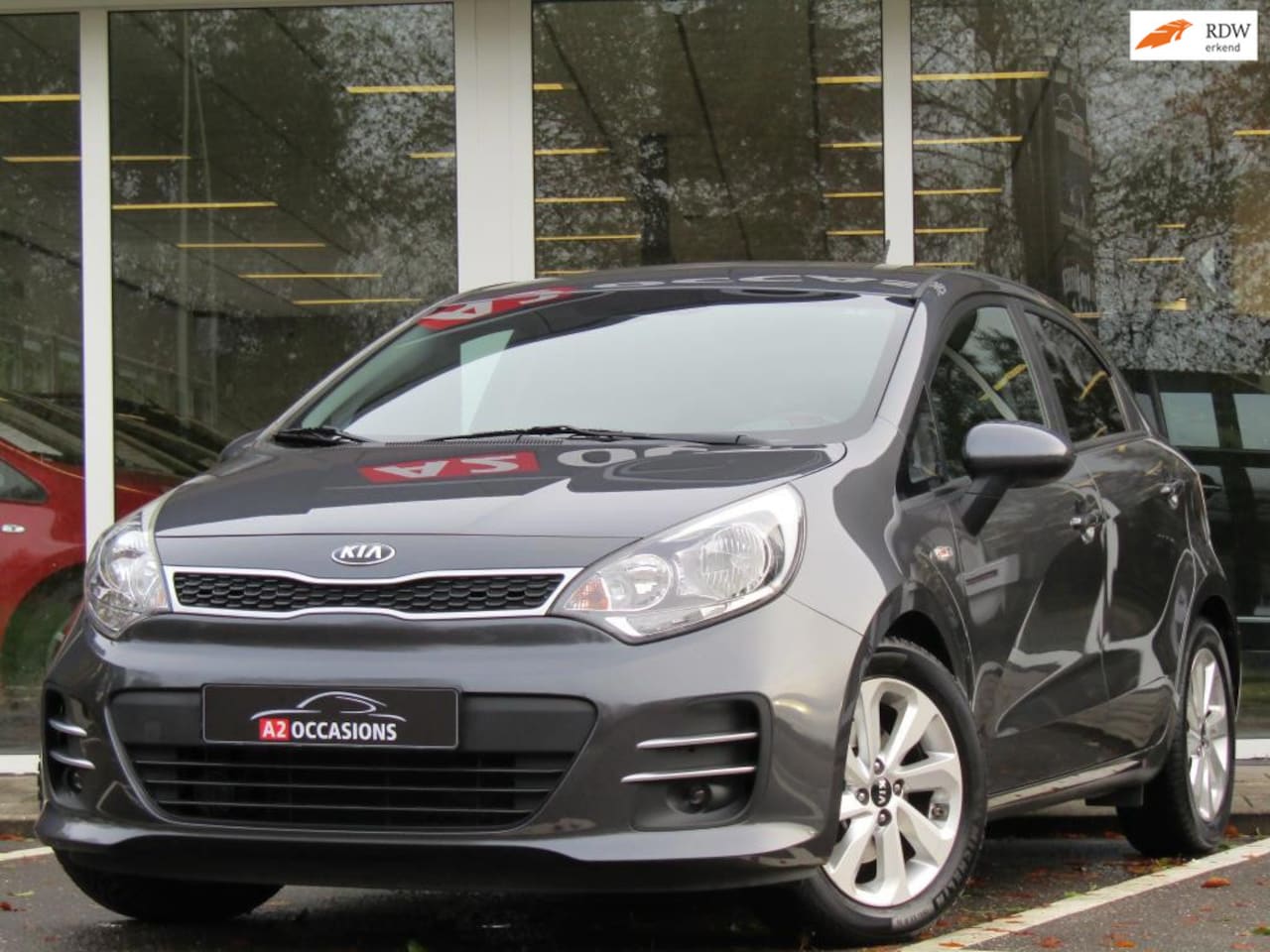 Kia Rio - 1.2 (4 cil) Clima/Bluetooth/Stoel+Stuurverw/PDC - AutoWereld.nl