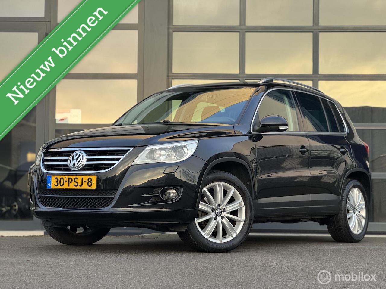 Volkswagen Tiguan - 1.4 TSI Sport&Style Trekhaak, Xenon - AutoWereld.nl