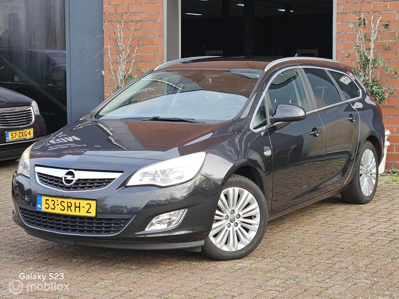 Opel Astra Sports Tourer - 1.4 Turbo Sport 1.4 Turbo Sport - AutoWereld.nl